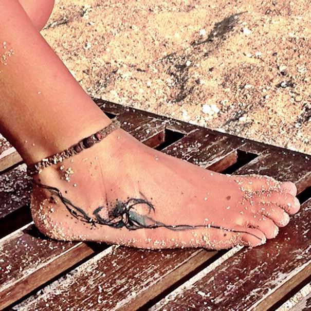 60 Perfect Wave Tattoo Designs