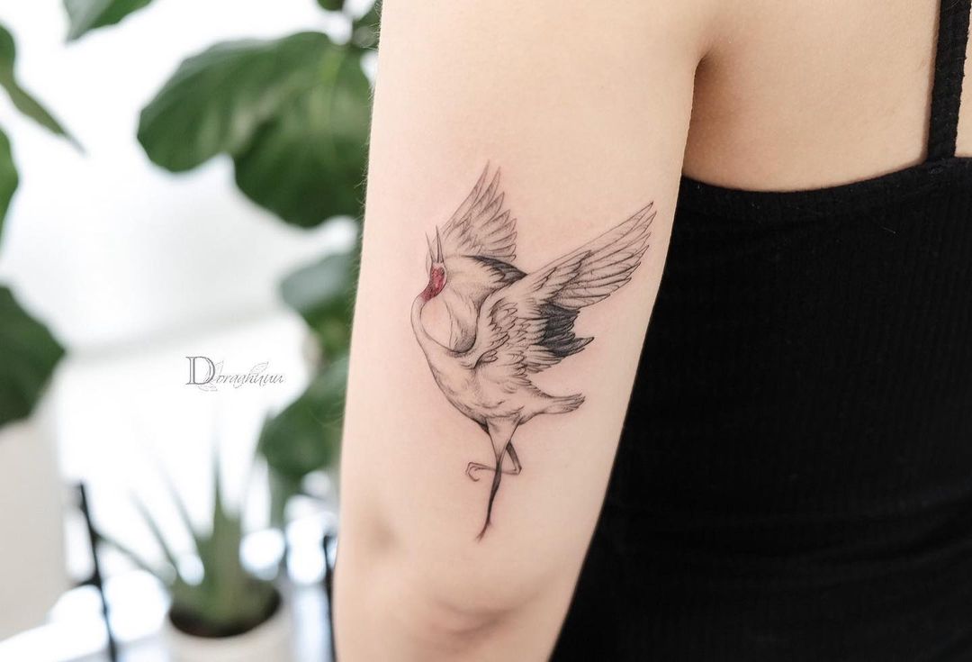 Infinite Youth and Eternal Happiness. Crane Tattoos Symbolism